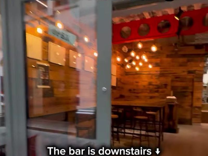 Glass door into the bar at Pilpel, 21 Lime Street Passage
